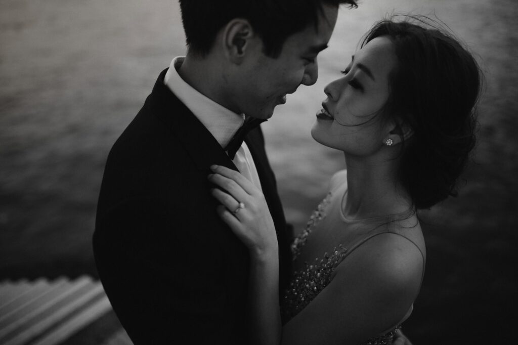 Man in tux going to kiss women