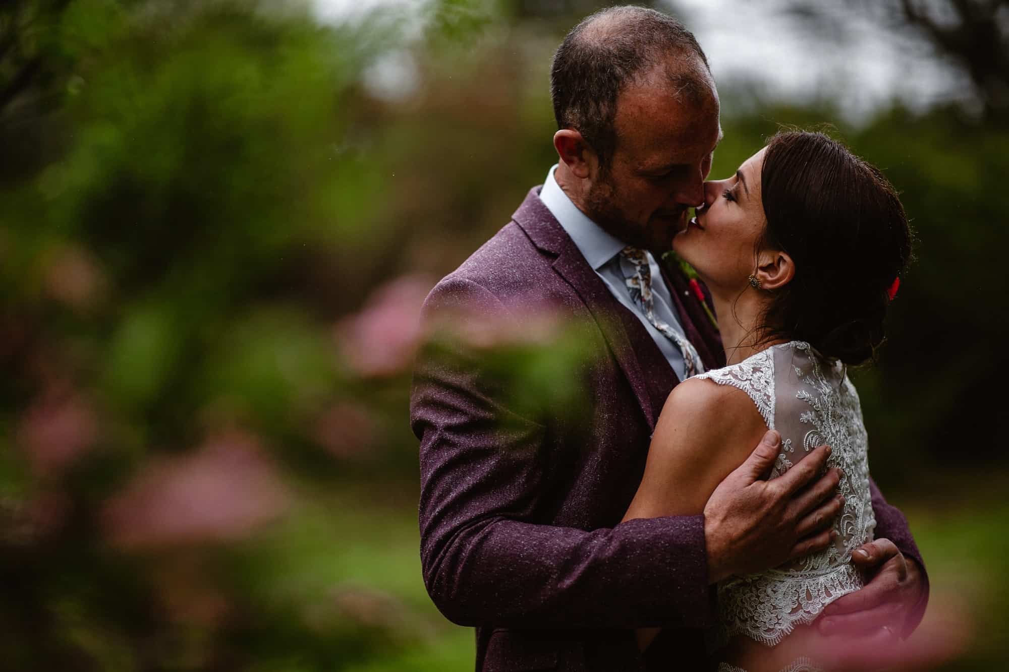 Couple at Low Hall The Lakes embracing on their wedding day