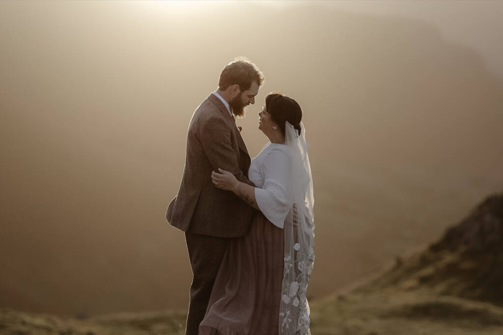 Bride & Groom during their Lake District Elopment on top of a mountain