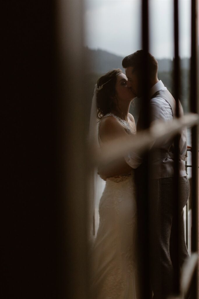 Bride and groom sharing a kiss