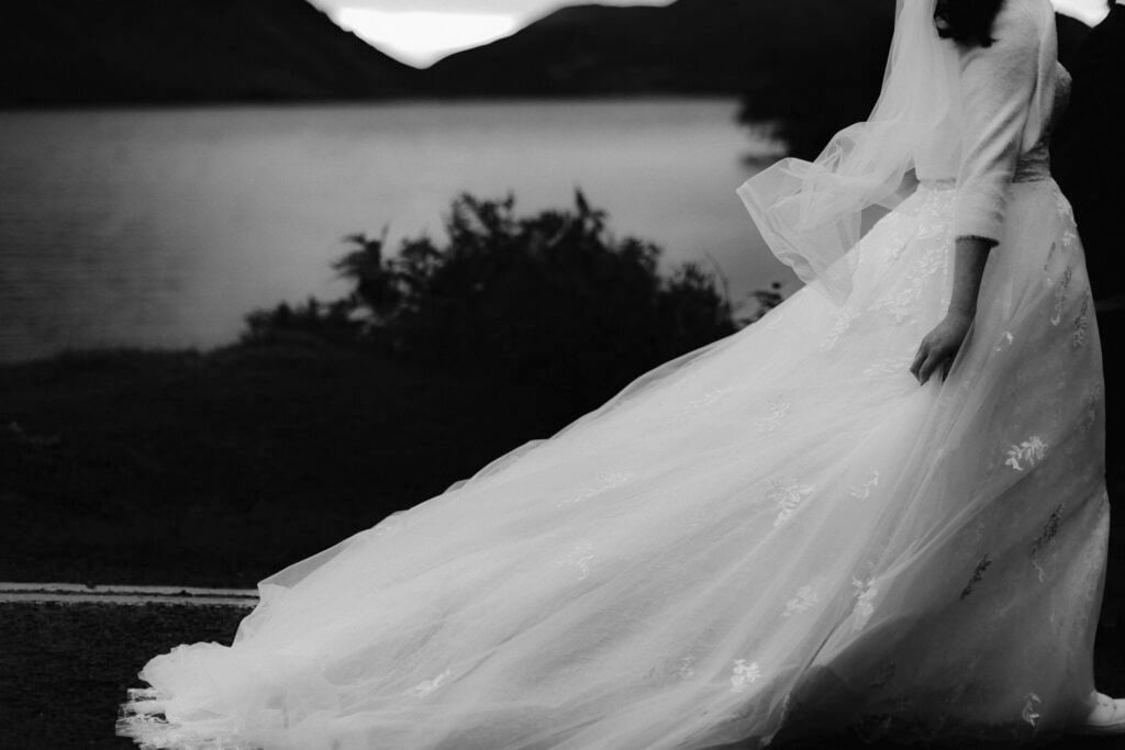 Wedding Dress trailing behind bride