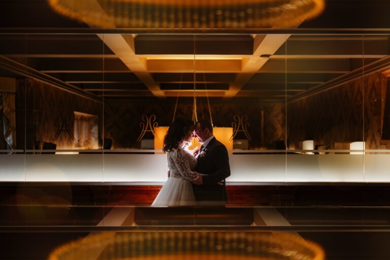 Bride & Groom photographed in a lift