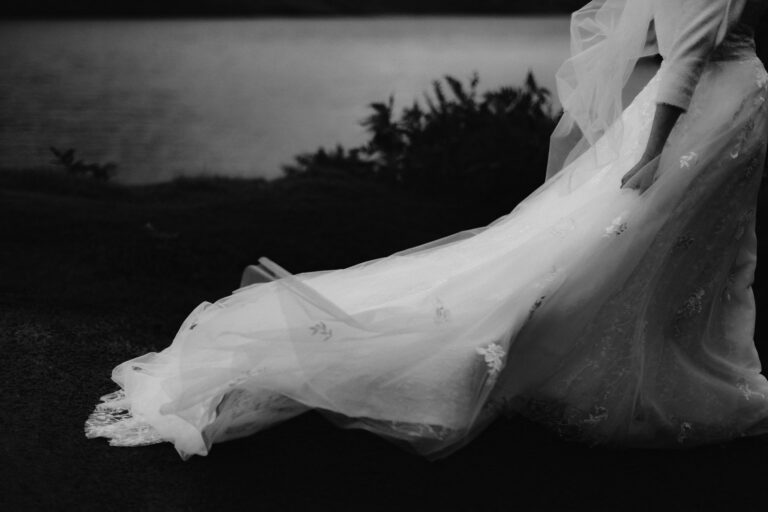 Wedding Dress billowing in wind as bride walks